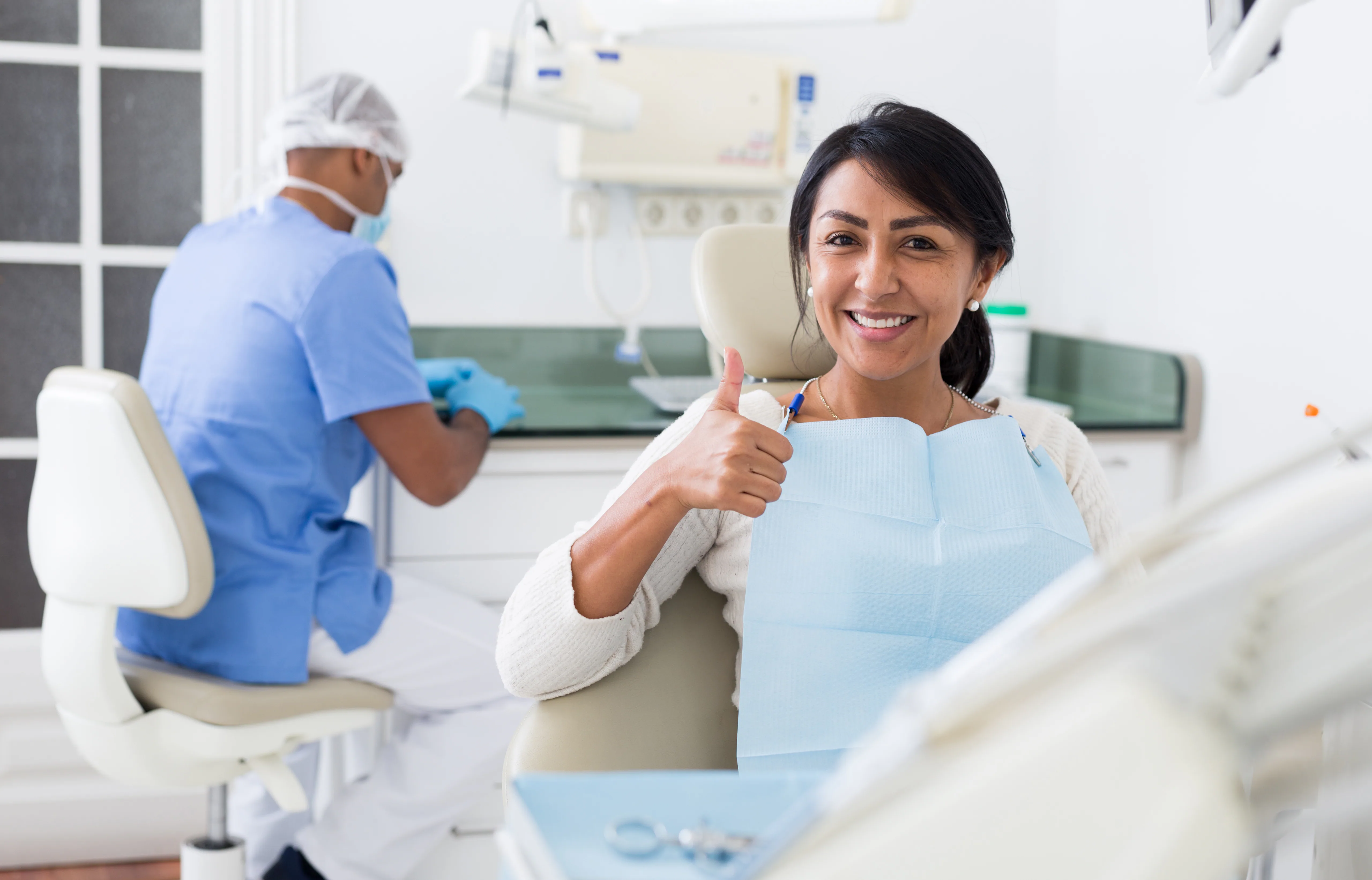 Dental professional completing a preventive examination